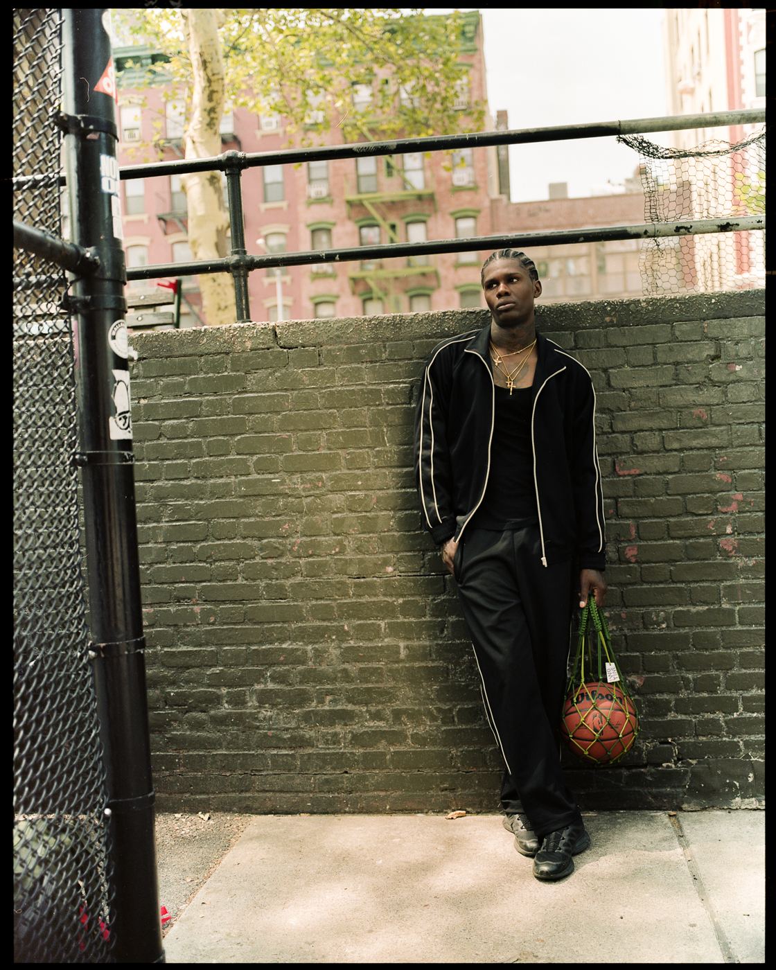 Against a brick wall
