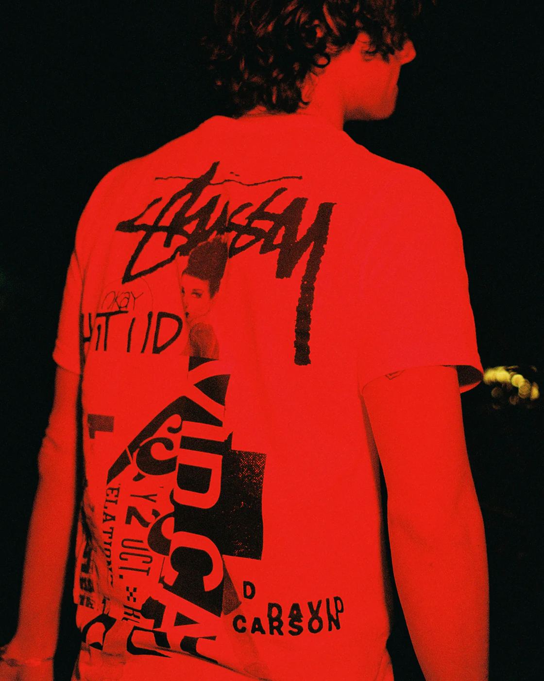 Tee worn under red light